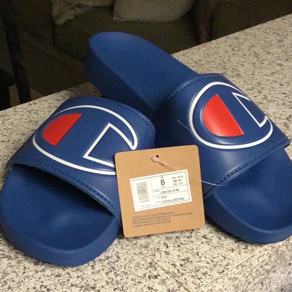 Boys/ men’s Champion slides- never worn!